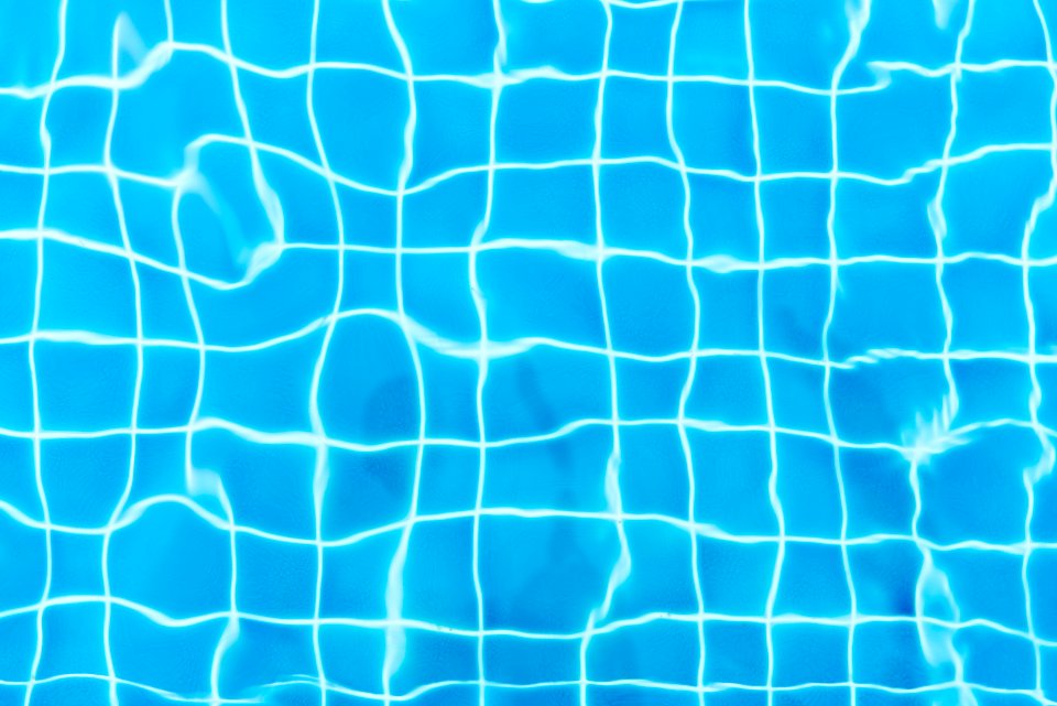 Top View Photography Of Blue Pool Tiles