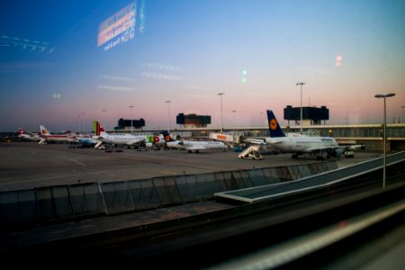 Airplanes On Hangar Under Blue Sky photo