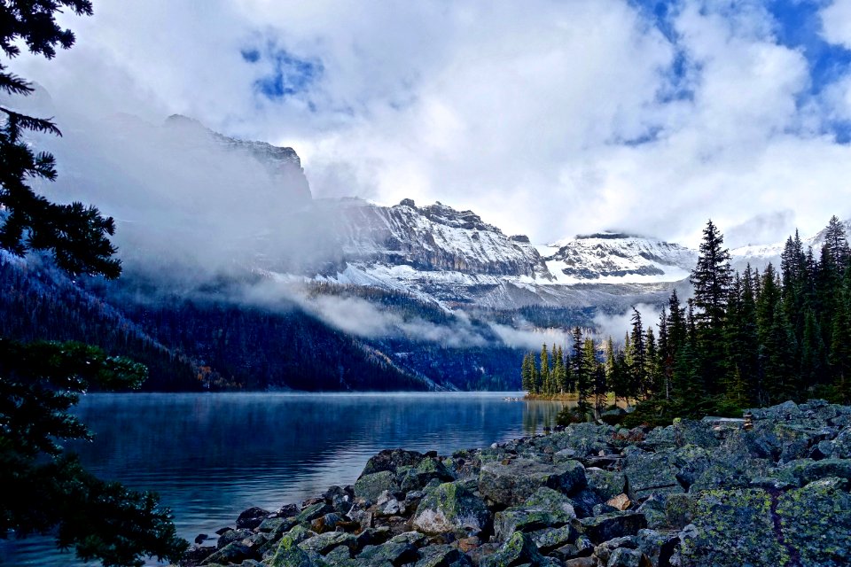 View Of Lake With Mountain Range In The Background photo