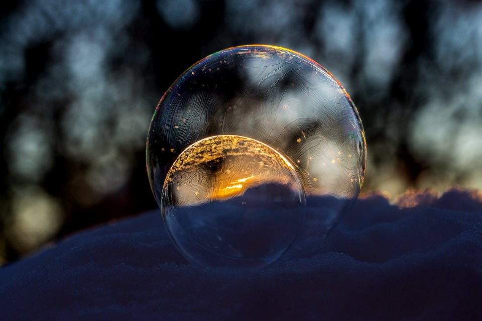 Close-up Of Crystal Ball Against Blurred Background
