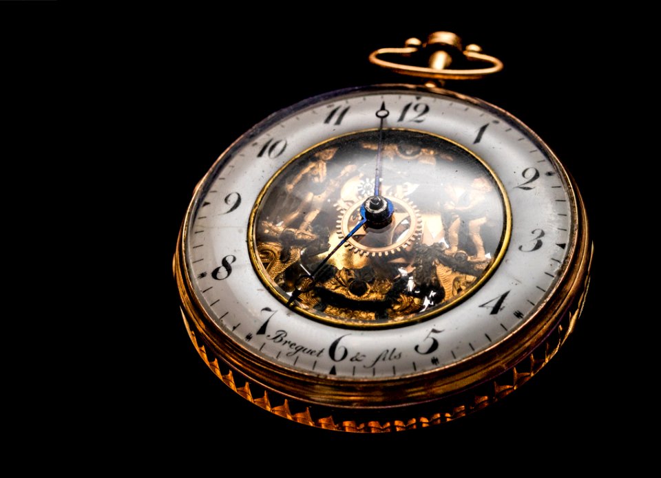 Round Gold-colored Pocket Watch
