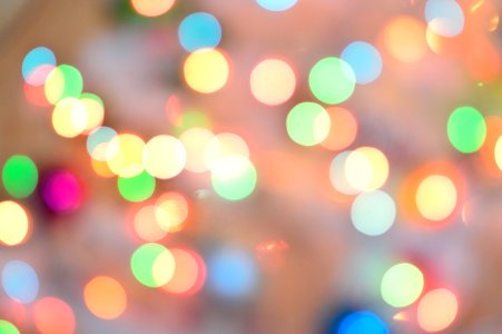 Defocused Image Of Illuminated Christmas Lights photo