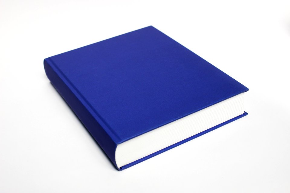 Low Angle View Of Paper Against White Background