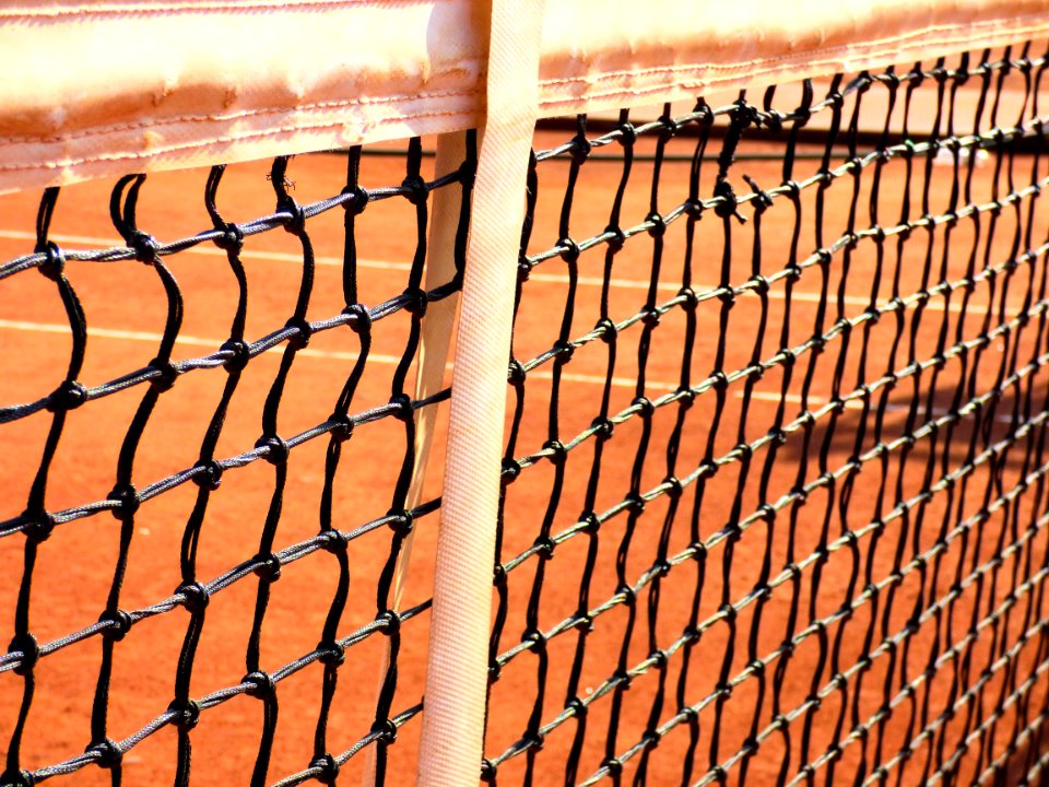 Close-up Of Chainlink Fence Against Sky