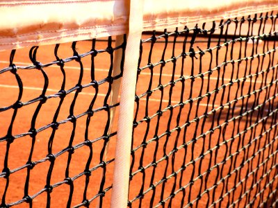 Close-up Of Chainlink Fence Against Sky photo