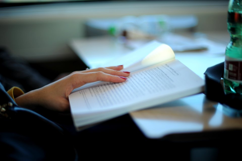 Woman Reading Her Notes