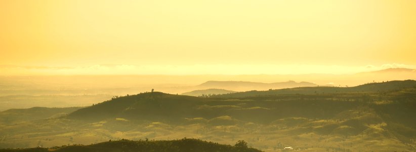 Scenic View Of Mountains Against Dramatic Sky