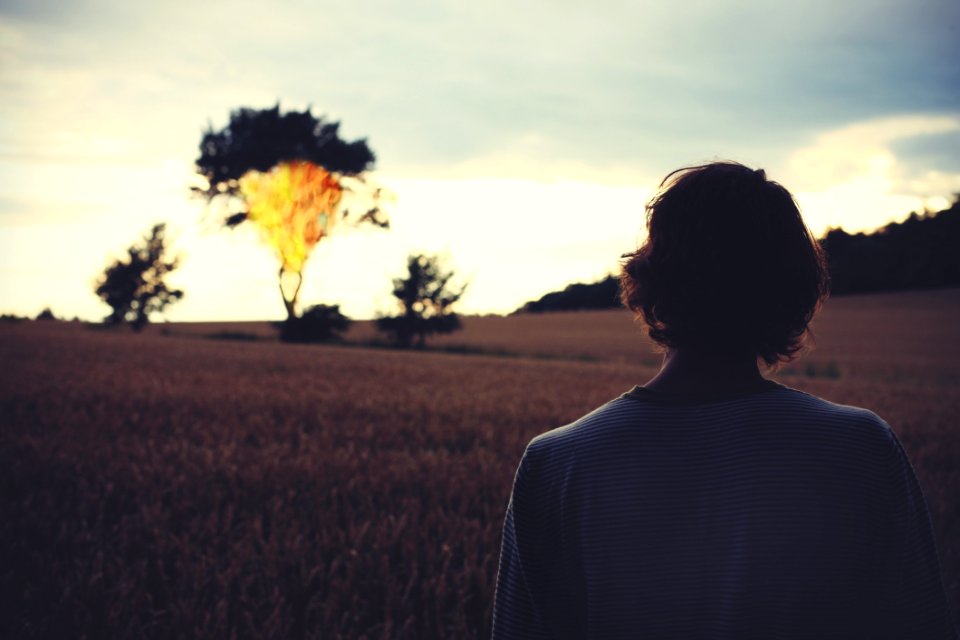 Woman Looking At Sunset