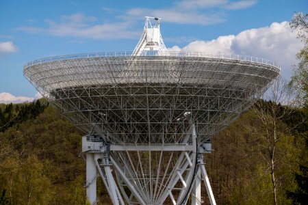 View Of Communications Tower Against Cloudy Sky