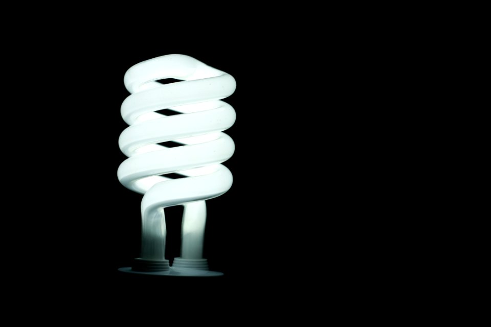Illuminated Lamp Against Black Background