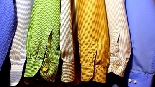 Close-up Of Clothes Hanging On Fabric photo