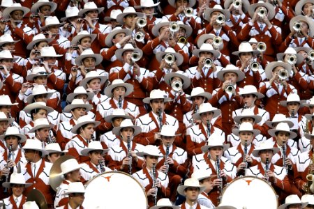 Group Of People In White Hat Playing Together Different Kinds Of Musical Instruments photo