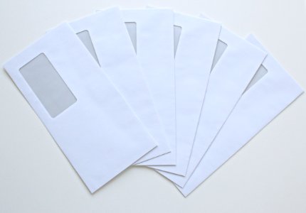 High Angle View Of Paper Against White Background photo