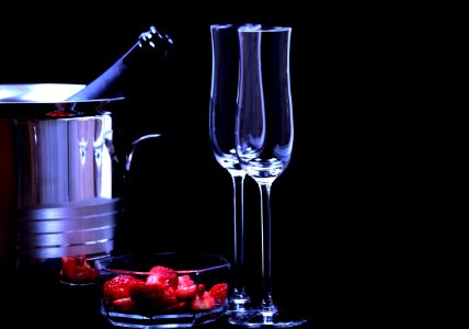 Close-up Of Beer In Glass Against Black Background photo