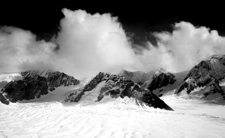 Snow Covered Mountain During Night Time