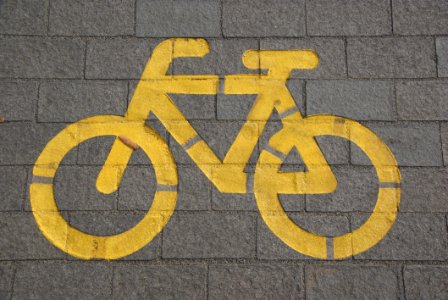 Bicycle Lane On Gray Concrete Road photo