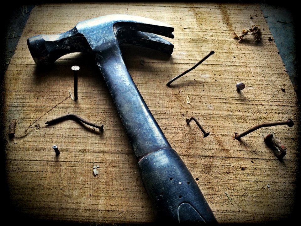 Black Claw Hammer On Brown Wooden Plank
