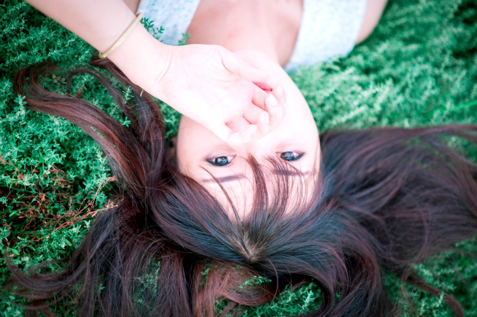 Brown Hair Woman Wearing White Tank Top photo