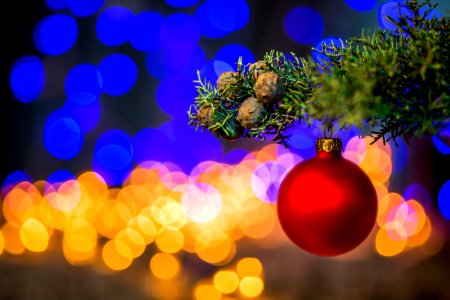 Red Baubles On Christmas Tree photo