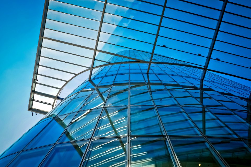 Low Angle View Of Glass High Rise Building photo