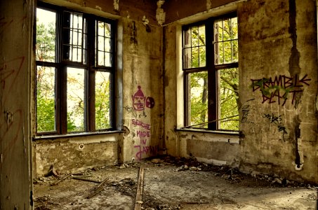 Brown Concrete Room With Windows During Daytime photo