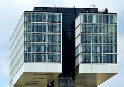 White Glass Window Concrete Separated High Rise Building photo