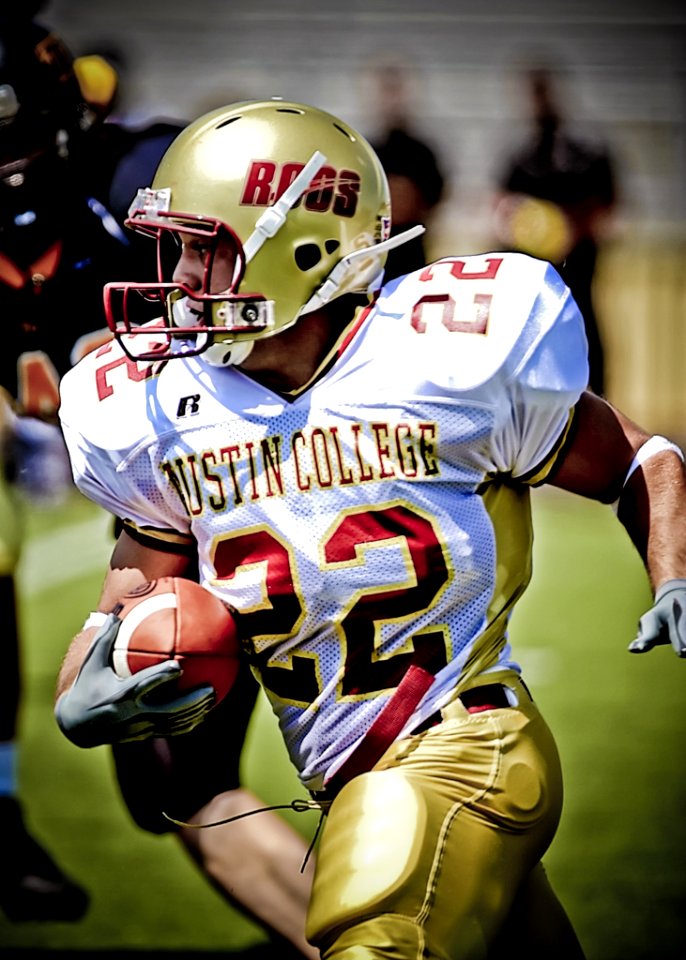Man In White And Red Austin College 22 Football Jersey During Daytime