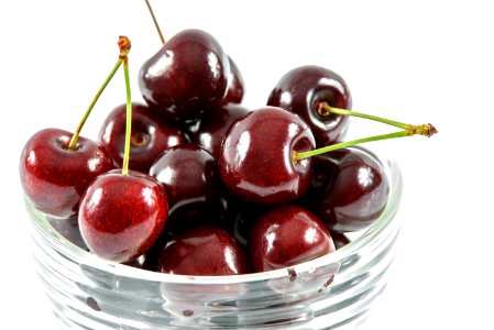 Red Cherry In Clear Glass Bowl photo