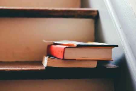 2 Book On Brown Wooden Stair