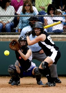 Two Female In Baseball Gears In Stadium Ready To Catch And Swing Baseball photo