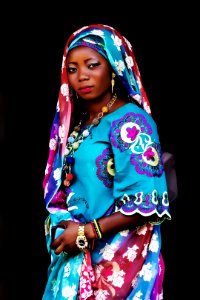 Woman In Blue Multicolored Floral Traditional Dress photo