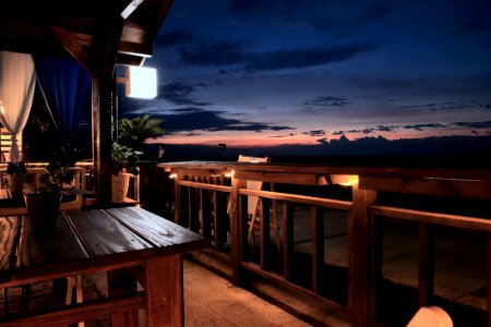 Vacant Tables And Chairs In The Balcony photo