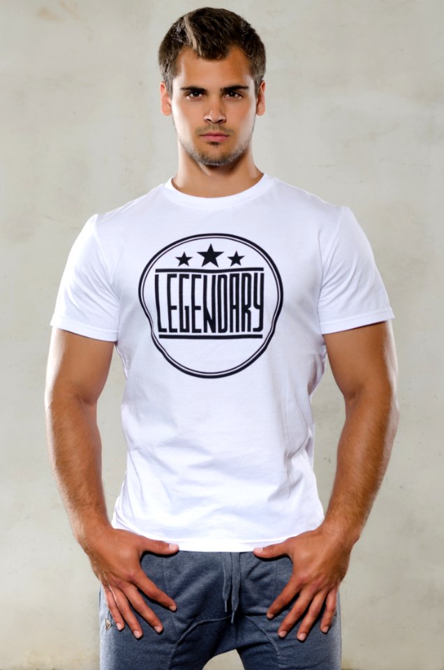 Man Wearing White And Black Legendary Print T-shirt photo