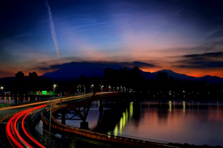 Light Rays On Bridge During Nighttime