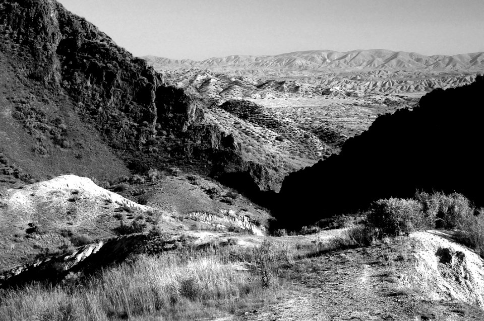 Grayscale Photo Of Mountain Range