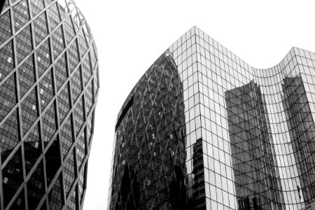 Greyscale Photo Of Glass Window Buildings photo