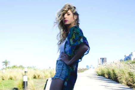 Woman In Green And Blue Cardigan