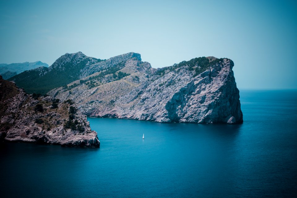 Photo Of Gray Island During Daylight