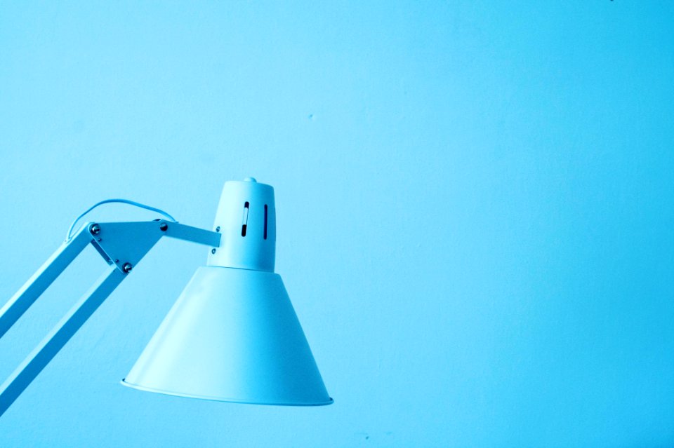 Close-Up Photography Of White Desk Lamp
