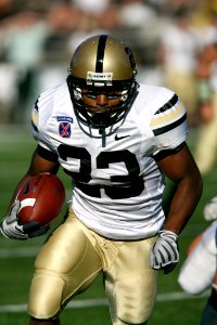 Man Wearing White Nike 23 Football Jersey On Green Field