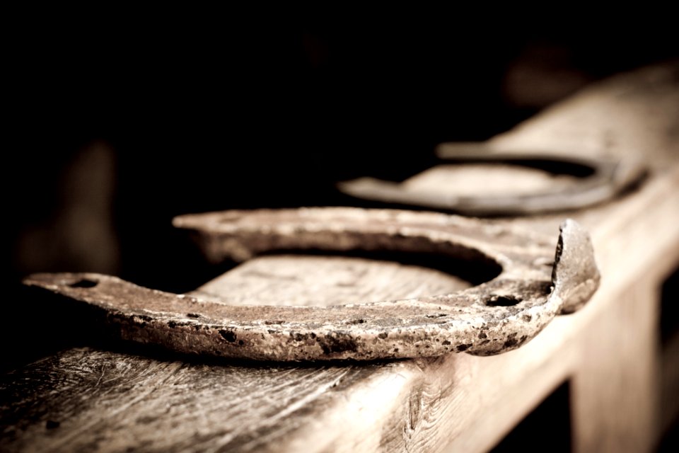 Gray Curve Tool On Brown Wooden Board