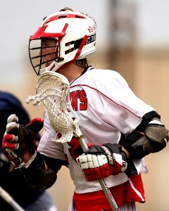 Man Wearing White And Red Lacrosse Uniform photo