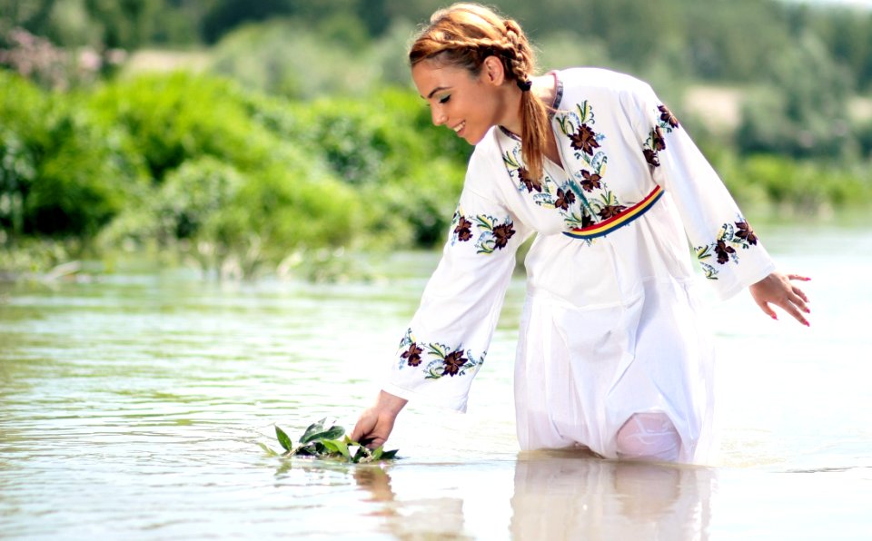Woman In White Dress In The Water At Daytime