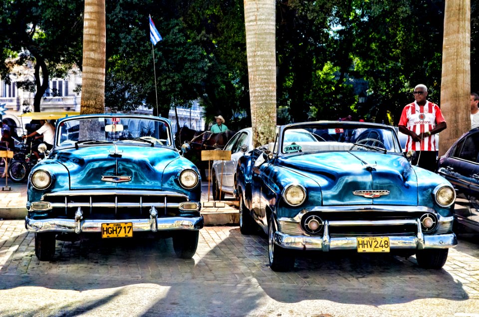 Blue Convertible Vintage Car Parked During Daytime