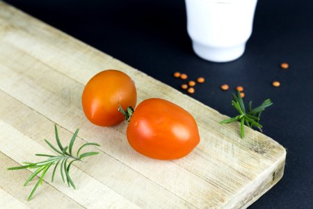 Close-up Of Tomatoes On Table photo