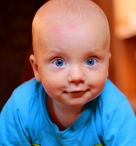 Baby Wearing Blue Crew Neck Shirt photo