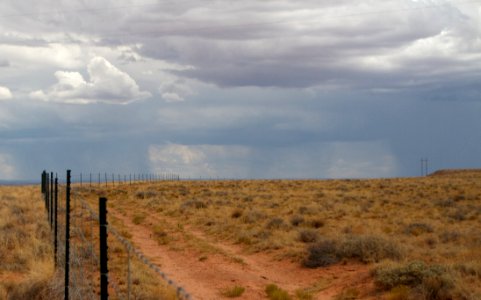 Fence Line Alll The Way To The Thunderstorms