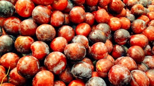 Piled Of Red Plums photo