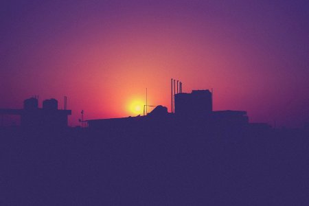 Sunset Behind Buildings photo