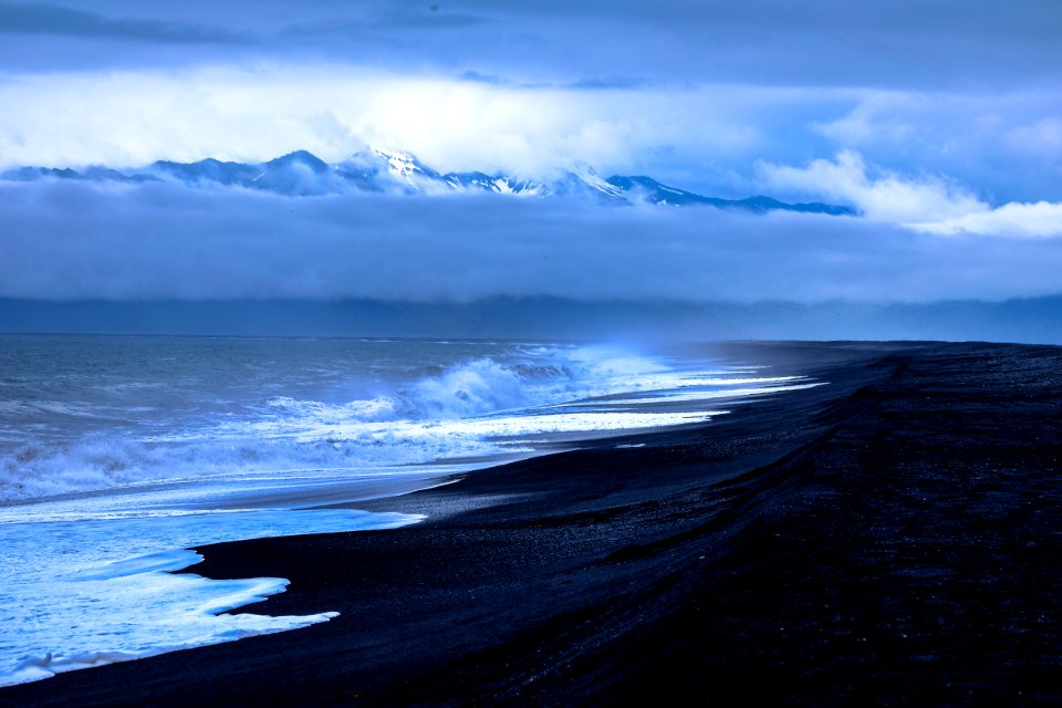 Waves On Waterfront With Blue Skies